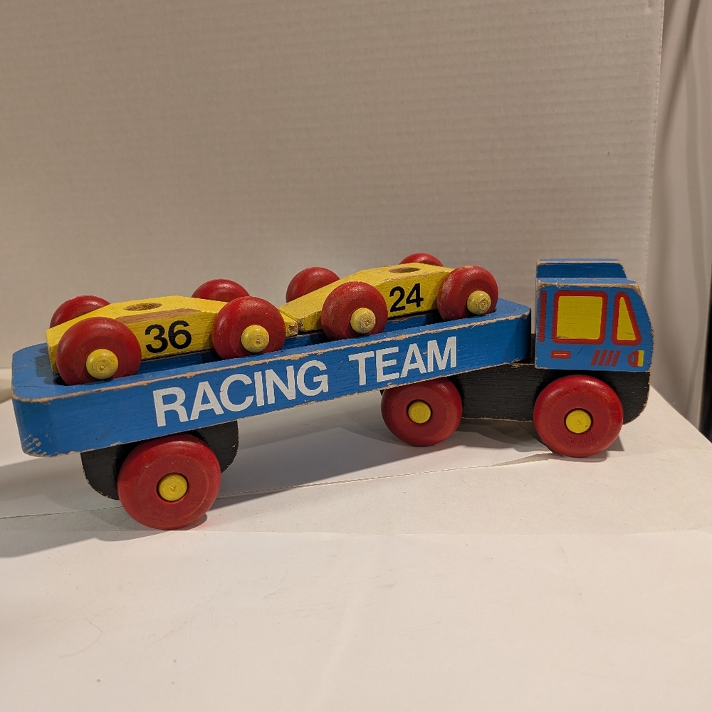 Wooden car carrier made by the wooden toy company CANADA. Toy Truck.